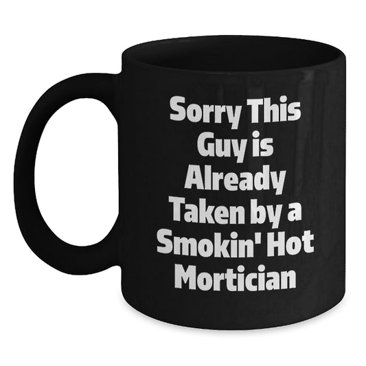 Funny Mortician Gifts from Friends - Sorry This Guy Is Already Taken Black Coffee Mug for Graduation, Unique Mortician Mug for Men - Main