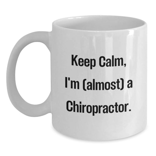 Funny Chiropractor Gifts from Friends for Birthday, White Coffee Mug with 'Keep Calm, I'm (almost) A Chiropractor.' Quote - Main