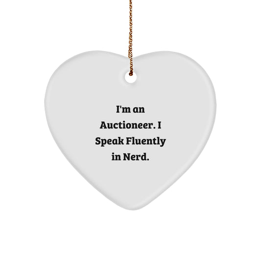 Funny Auctioneer Gifts from Friends to Family, I'm An Auctioneer. I Speak Fluently In genius., Heart Ornament for Christmas - Image 1