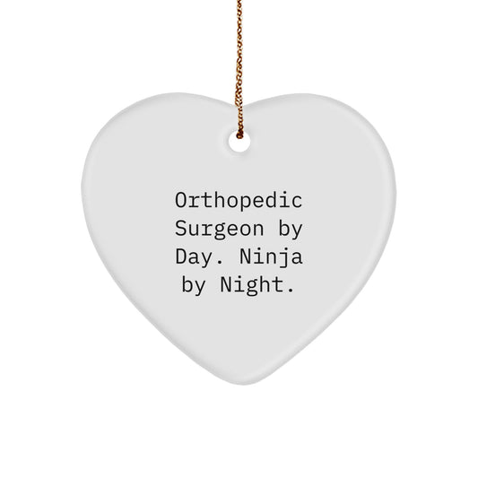 Orthopedic Surgeon Gifts for Men - Heart Ornament with Funny Quote 'Orthopedic Surgeon By Day. Ninja By Night.' - Unique Christmas Unique Gift for Orthopedic Surgeon, Friends, and Coworkers - Image 1