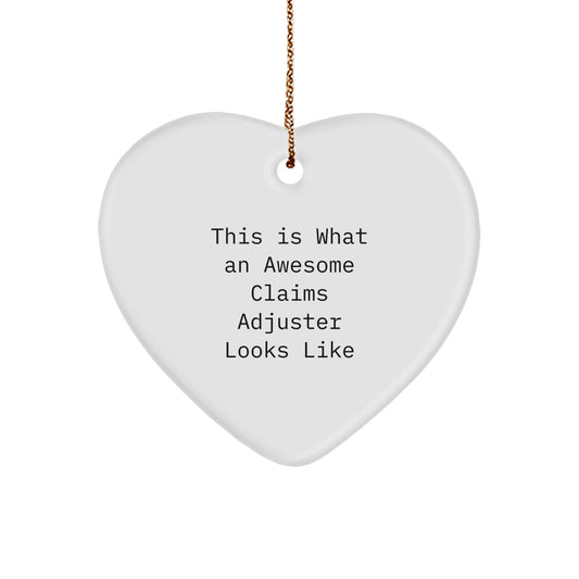 Funny Claims Adjuster Gifts from Friends for Christmas - Heart Ornament with 'This Is What An Awesome Claims Adjuster Looks Like' Quote - Image 1