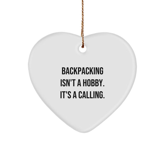 Funny Backpacking Gifts from Friends and Family - Heart Ornament with 'Backpacking Isn't A Hobby. It's A Calling.' Quote for Christmas - Image 1