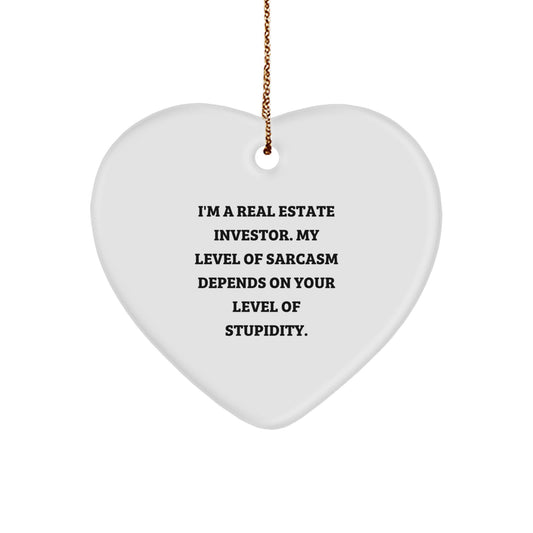 Funny Real Estate Investor Gifts from Friends - 'I'm A Real Estate Investor. My Level Of Sarcasm Depends On Your Level Of Stupidity.' Heart Ornament for Christmas - Image 1