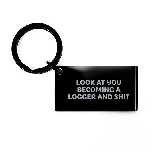 Funny Logger Gifts from Men to Friends for Graduation Keychain with Engraved Message 'Look At You Becoming A Logger And Shit' - Image 1