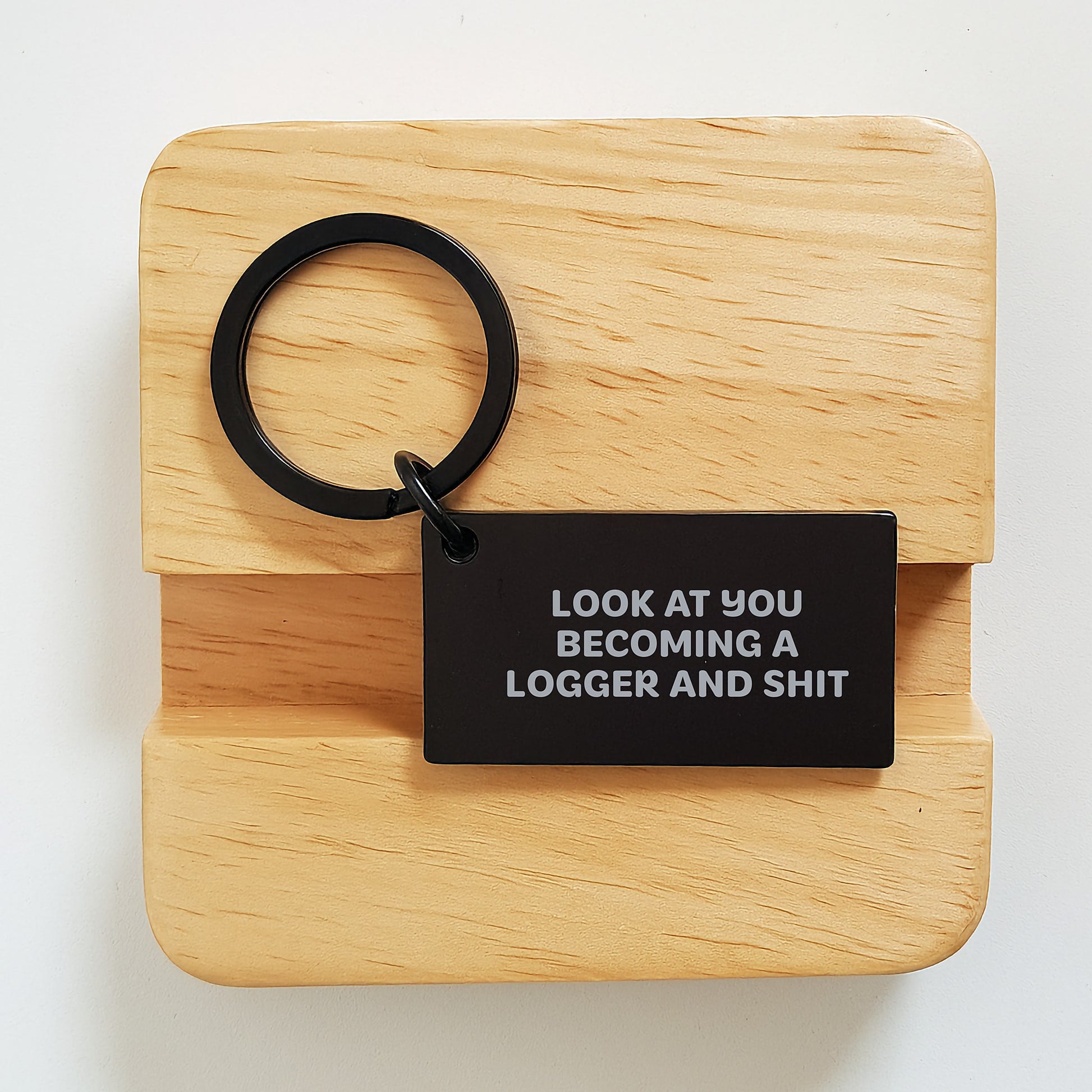 Funny Logger Gifts from Men to Friends for Graduation Keychain with Engraved Message 'Look At You Becoming A Logger And Shit' - Image 2