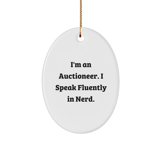 Auctioneer Gifts from Friends, Fun Oval Ornament for Christmas, 'I'm An Auctioneer. I Speak Fluently In genius.' - Image 1