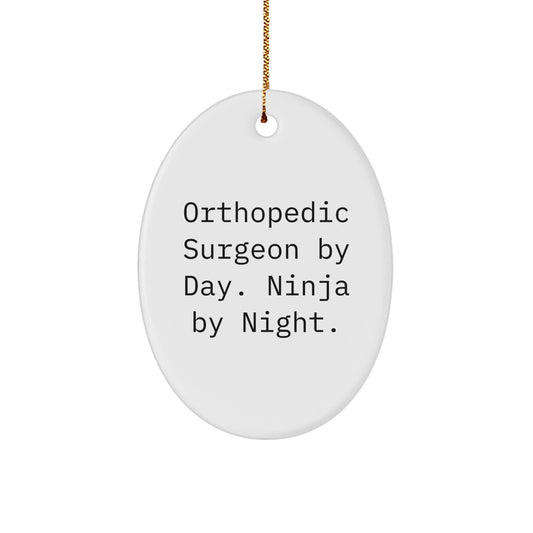 Orthopedic Surgeon Gifts from Men for Christmas Unique Oval Ornaments, Quote: 'Orthopedic Surgeon By Day. Ninja By Night.' - Image 1