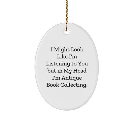 Antique Book Collecting Gifts from Friends for Men, 'I Might Look Like I'm Listening To You But In My Head I'm Antique Book Collecting' Oval Ornament, Christmas Unique Finds - Image 1