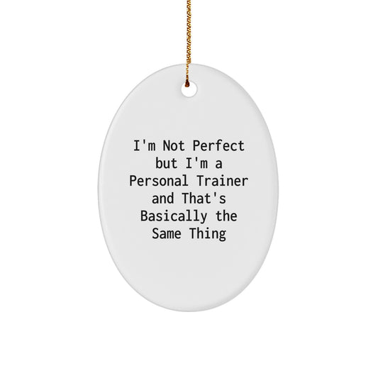 Funny Personal Trainer Gifts from Friends for Christmas - 'I'm Not Perfect But I'm A Personal Trainer And That's Basically The Same Thing' Oval Ornament - Image 1