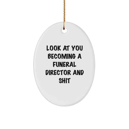 Funny Funeral Director Gifts from Friends for Christmas - 'Look At You Becoming A Funeral Director And Shit' Oval Ornament - Image 1