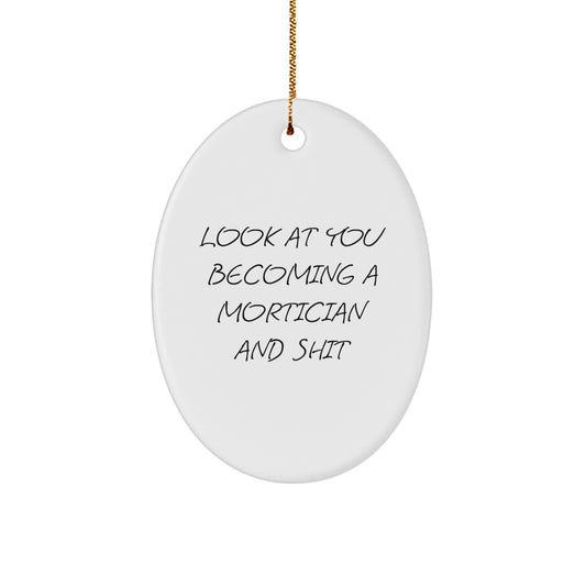 Funny Mortician Gifts for Friends and Family - 'Look At You Becoming A Mortician And Shit' Oval Ornament, Perfect for Christmas - Image 1